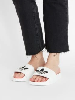 Adidas Originals Tøfler Strand-/badesko ADILETTE LITE Mænd Hvid -Nike Sportswear 8c3106e4078d7bff746d81a4ef034838